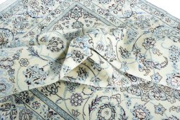 Surface texture of New Nain rug with natural Wool and intricate pattern