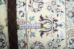 Backside of handmade 2000s Nain rug showing knot structure and weave density