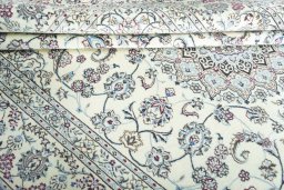 Close-up detail of New Nain rug from Iran / Persia showing Wool weave