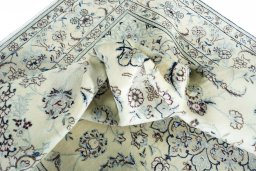 Surface texture of New Nain rug with natural Wool and intricate pattern