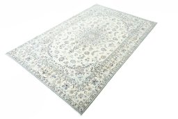 Corner detail of New Nain rug showing border pattern and Wool pile