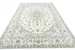 Surface texture of New Nain rug with natural Wool and intricate pattern