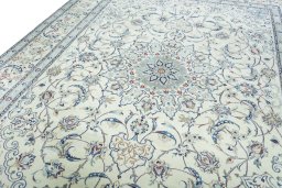 Backside of handmade 2000s Nain rug showing knot structure and weave density