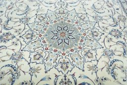 Central medallion detail of 2000s Nain rug from Iran / Persia