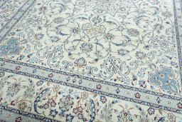 Close-up detail of 2000s Nain rug from Iran / Persia showing Wool weave
