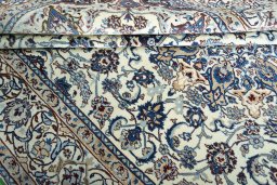 Close-up detail of 2000s Nain rug from Iran / Persia showing Wool weave