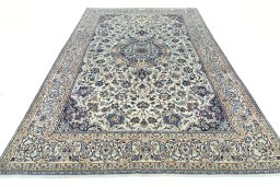 Surface texture of 2000s Nain rug with natural Wool and intricate pattern