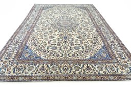 Surface texture of 2000s Nain rug with natural Wool and intricate pattern