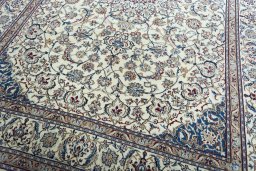 Close-up detail of 2000s Nain rug from Iran / Persia showing Wool weave