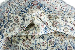Surface texture of New Nain rug with natural Wool and intricate pattern