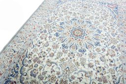 Backside of handmade New Nain rug showing knot structure and weave density