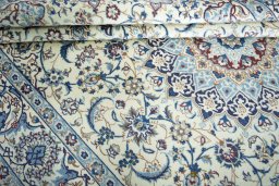 Close-up detail of 2000s Nain rug from Iran / Persia showing Wool weave