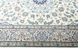 Corner detail of New Nain rug showing border pattern and Wool pile