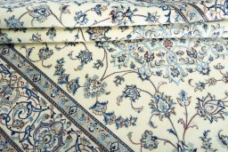 Surface texture of New Nain rug with natural Wool and intricate pattern
