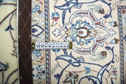 Central medallion detail of New Nain rug from Iran / Persia