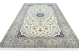 Surface texture of New Nain rug with natural Wool and intricate pattern