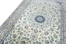 Backside of handmade New Nain rug showing knot structure and weave density