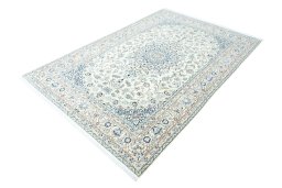 Corner detail of New Nain rug showing border pattern and Wool pile