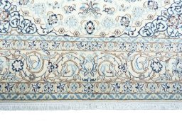 Full view of New Nain rug from Iran / Persia, 302 × 198 cm in Beige tones