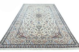 Surface texture of 2000s Nain rug with natural Wool and intricate pattern