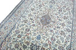 Backside of handmade 2000s Nain rug showing knot structure and weave density