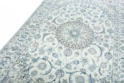 Backside of handmade 2000s Nain rug showing knot structure and weave density