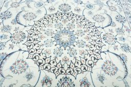 Central medallion detail of 2000s Nain rug from Iran / Persia