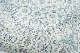 Close-up detail of 2000s Nain rug from Iran / Persia showing Wool weave