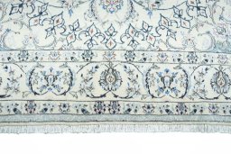 Full view of 2000s Nain rug from Iran / Persia, 286 × 196 cm in Beige tones