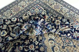 Surface texture of 2000s Nain rug with natural Wool and intricate pattern