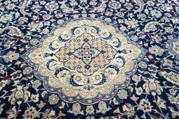 Central medallion detail of 2000s Nain rug from Iran / Persia
