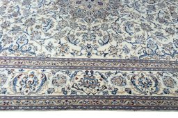 Corner detail of 2000s Nain rug showing border pattern and Wool pile