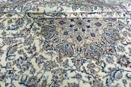 Close-up detail of 2000s Nain rug from Iran / Persia showing Wool weave