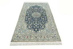 Surface texture of 1970s Nain rug with natural Cork and intricate pattern