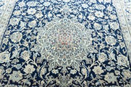 Central medallion detail of 1970s Nain rug from Iran / Persia