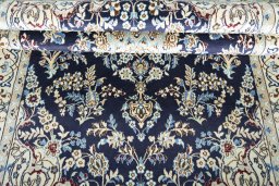 Close-up detail of 2000s Nain rug from Iran / Persia showing Wool weave