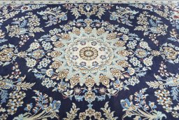 Central medallion detail of 2000s Nain rug from Iran / Persia