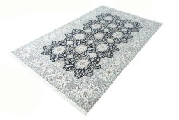 Corner detail of New Nain rug showing border pattern and Cork pile