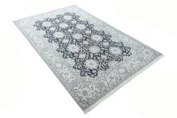 Close-up detail of New Nain rug from Iran / Persia showing Cork weave