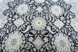 Central medallion detail of New Nain rug from Iran / Persia