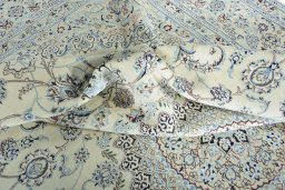Close-up detail of New Nain rug from Iran / Persia showing Wool weave
