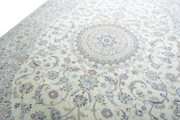 Backside of handmade New Nain rug showing knot structure and weave density