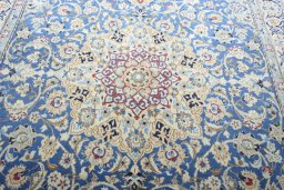 Central medallion detail of 2000s Nain rug from Iran / Persia