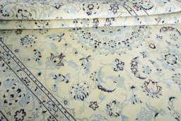 Close-up detail of New Nain rug from Iran / Persia showing Wool weave