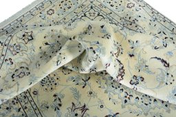 Surface texture of New Nain rug with natural Wool and intricate pattern