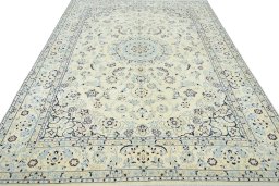 Surface texture of New Nain rug with natural Wool and intricate pattern