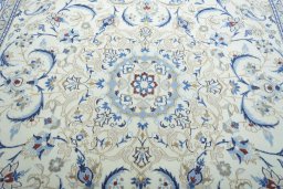 Central medallion detail of 2000s Nain rug from Iran / Persia