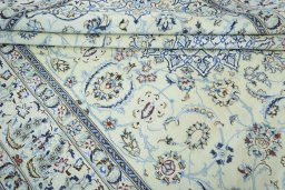 Close-up detail of 2000s Nain rug from Iran / Persia showing Wool weave