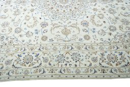 Corner detail of 2000s Nain rug showing border pattern and Wool pile