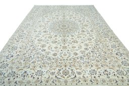 Surface texture of 2000s Nain rug with natural Wool and intricate pattern